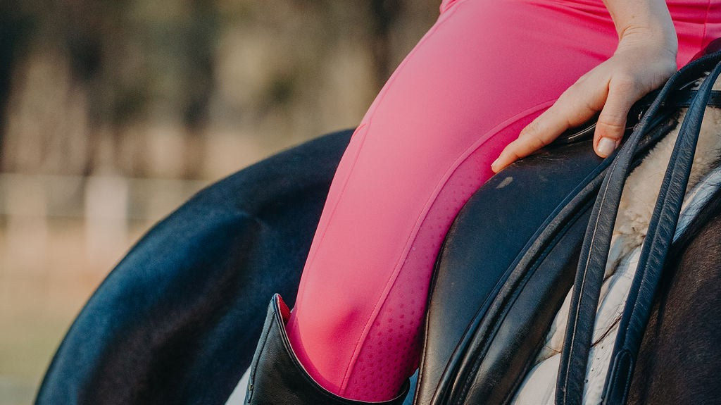 Hot Pink riding tights worn by girl on horse
