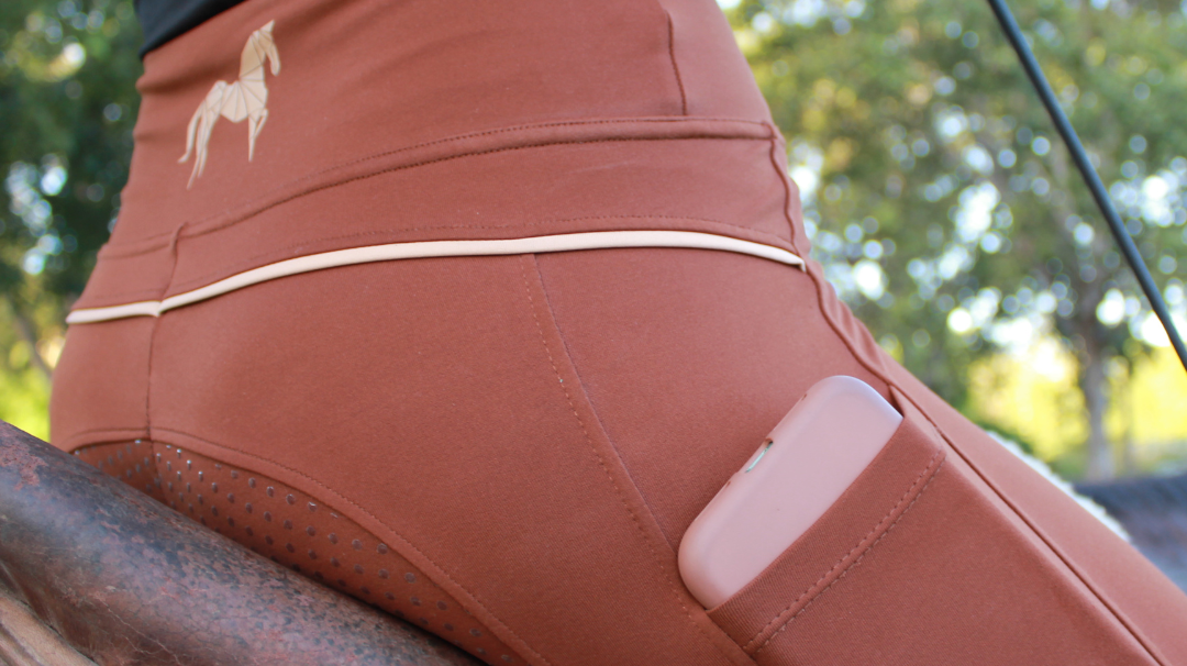 brown riding tights with cream seam detail