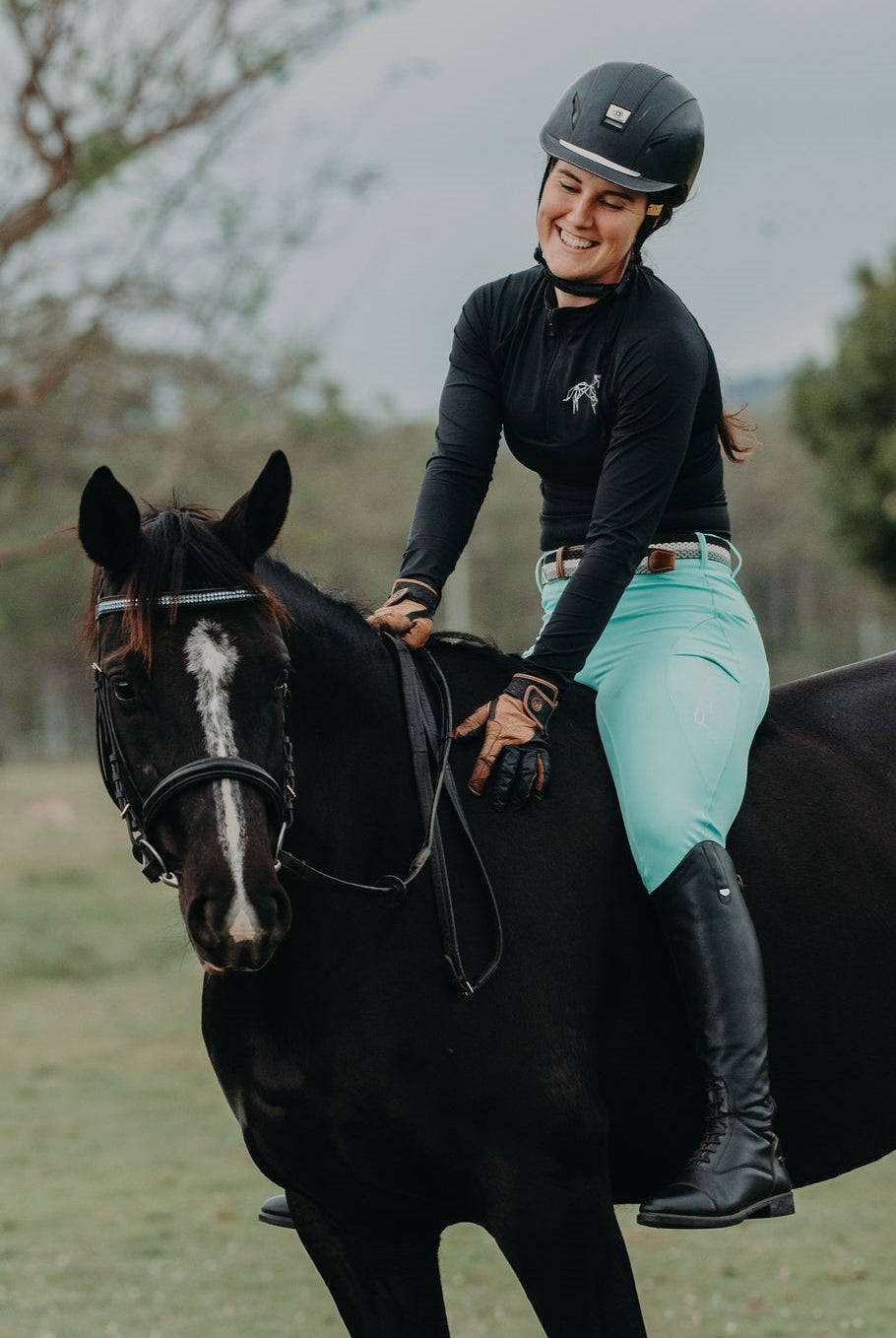 Aqua and black outfit for colourful equestrians