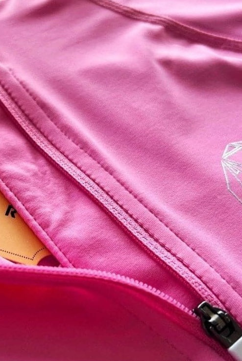 Close up picture of beautiful pink base layer with stunning horse print and zip